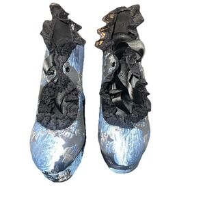 black & blue floral platform heels with ribbon detail. Never worn 7 M